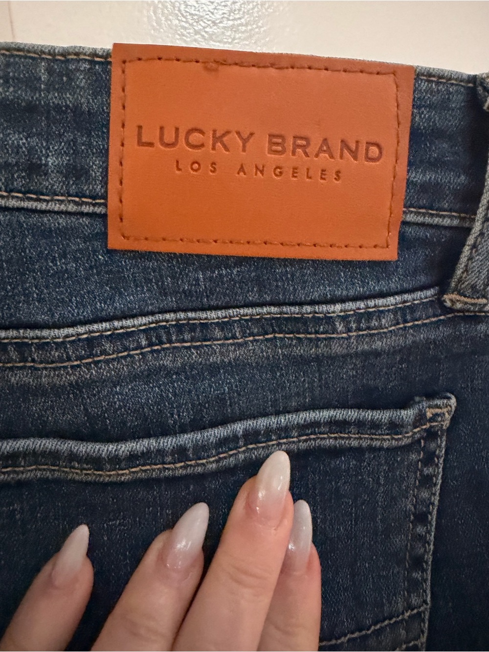 Lucky Brand Women's High-Rise Dark Indigo Jeans with Leather Patch